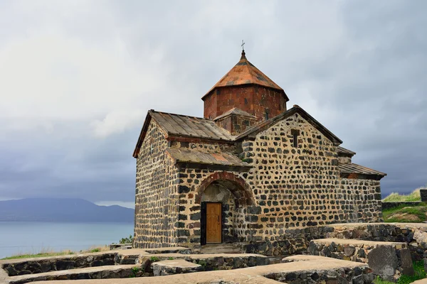 Shrine of the Armenian people. Temple on Lake Sevan. Thunder Sky