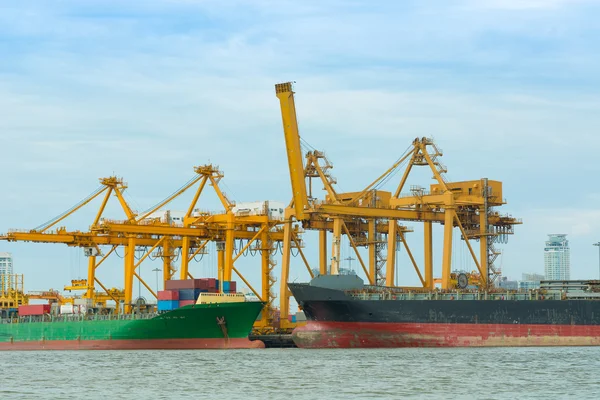 Cargo ship loading containers on schedule.