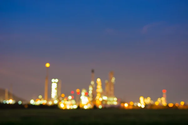 Bokeh of oil refinery plant at twilight, Blur background.