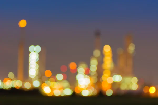 Bokeh of oil refinery plant at twilight, Blur background.