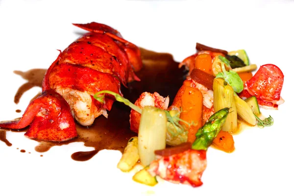 Roasted lobster with vegetables and sauce