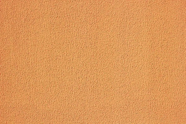 Plaster texture wall. Exterior orange stucco.