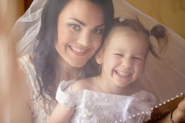 Mother and daughter in a wedding day