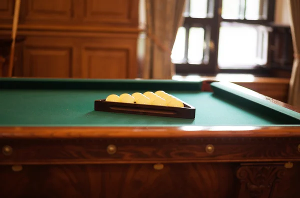 Pool table with balls