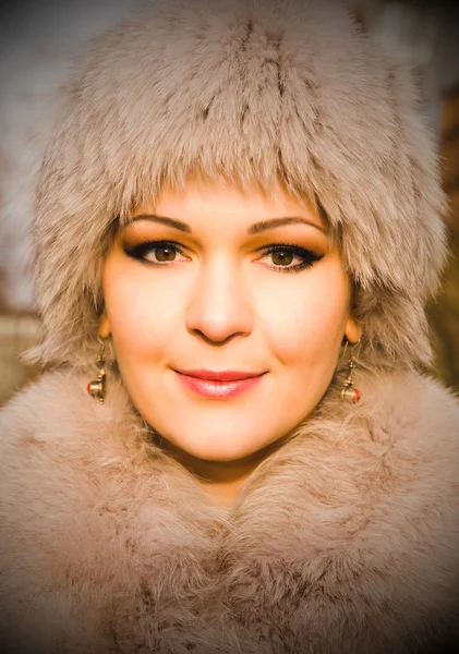 Attractive woman in fur hat