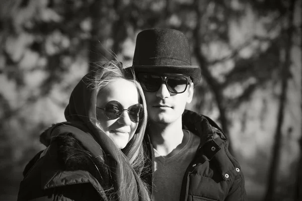 Casual young couple in a park. Black and white photo