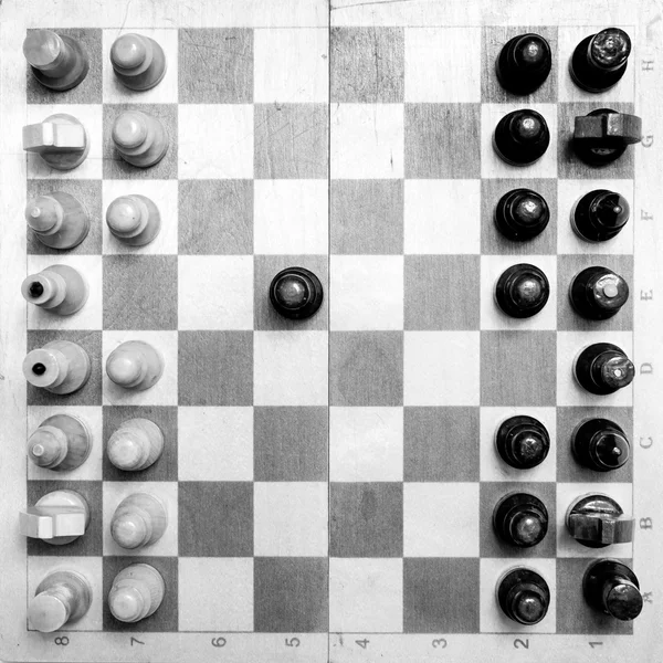 Black & white checkerboard with figures on black white background