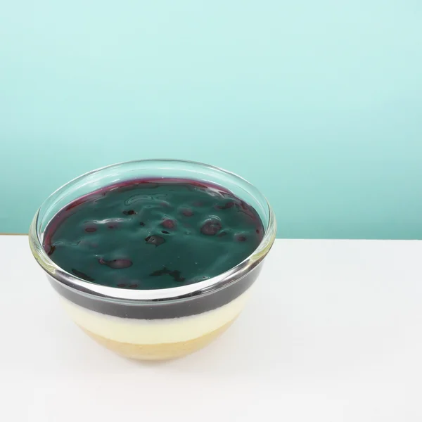 The homemade blueberry cheese cake in the small glass bowl