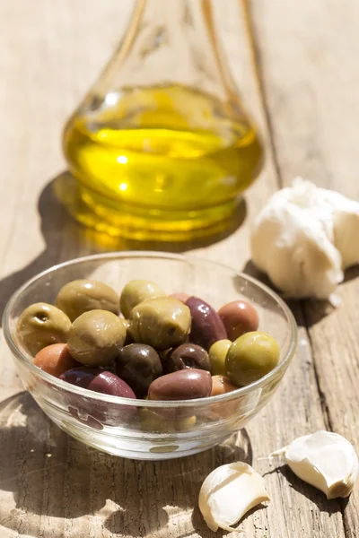 Olive oil, olives and garlic
