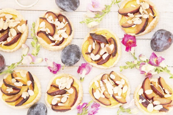 Plum tarts with flowers