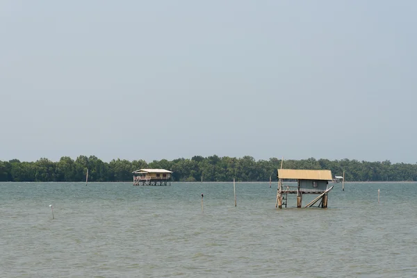 Fisherman house in the sea.