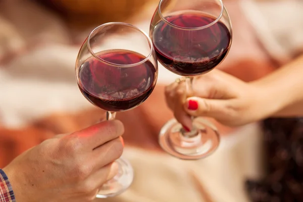Man and woman drinking red wine