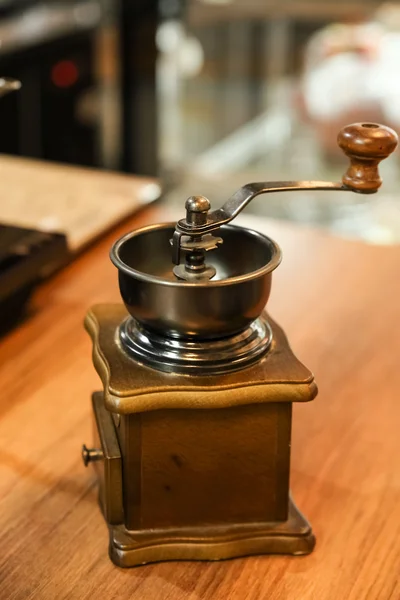 Coffee grinder in shop background decoration item design