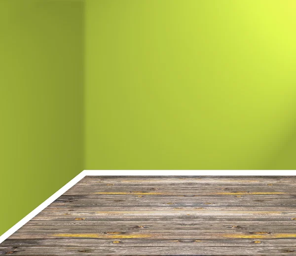 Empty room corner with wooden floor and green wall