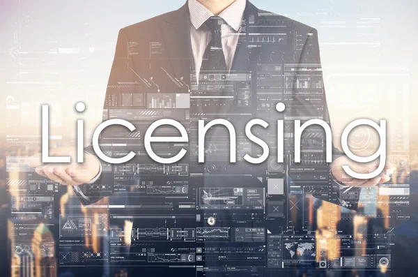 Businessman is presenting text: Licensing