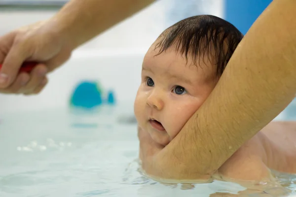 Newborn baby bathe and swim