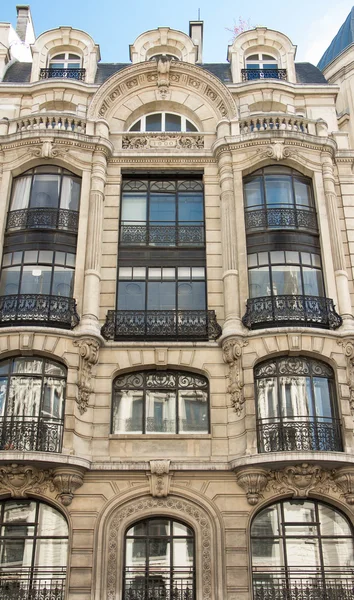 The facade of typical French building, Paris, France.