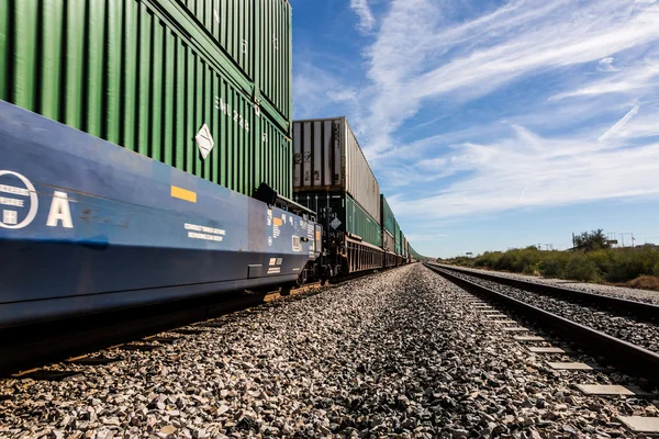 Cargo train speeding on track