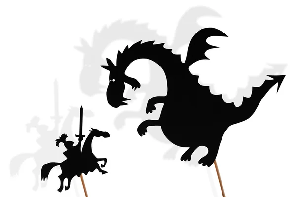 Shadow puppets of dragon and knight