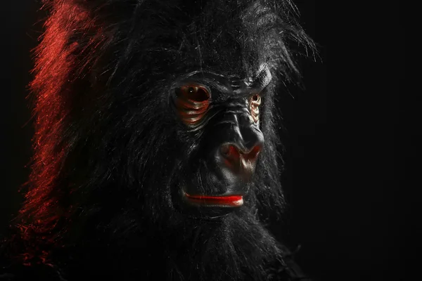 Portrait of a man with gorilla costume