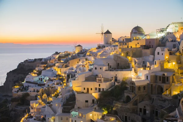 Beautiful night in Santorini Greece, sea, sunset, white Greek houses in the evening