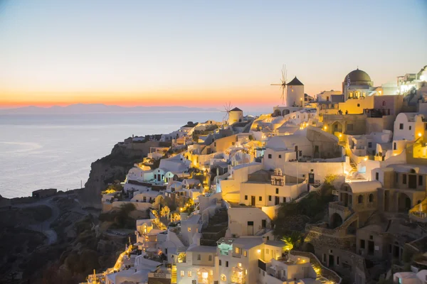 Beautiful night in Santorini Greece, sea, sunset, white Greek houses in the evening