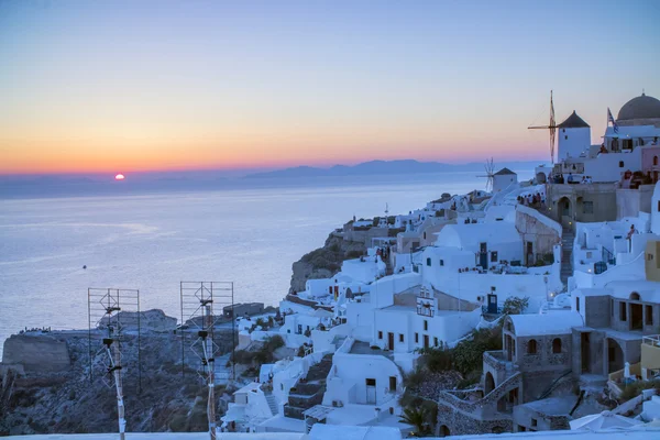 Beautiful night in Santorini Greece, sea, sunset, white Greek houses in the evening