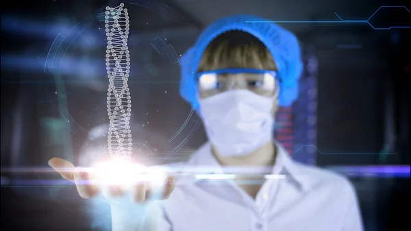 Doctor with futuristic tablet on hand.  DNA. Medical concept of the future.