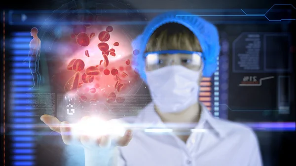 Doctor with futuristic hud screen tablet. Red blood cell, eritrocite. Medical concept of the future