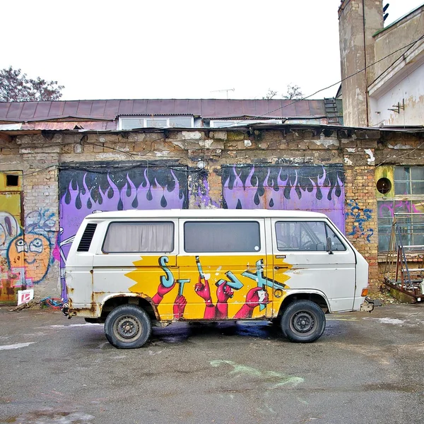 Old car with graffiti