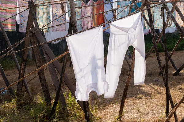 Drying clothes in sunlight.