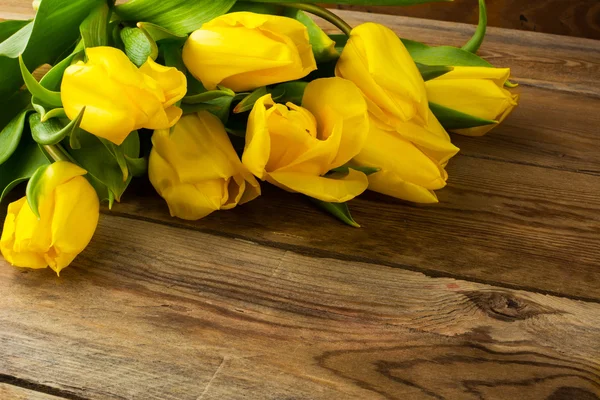 Yellow tulips birthday background