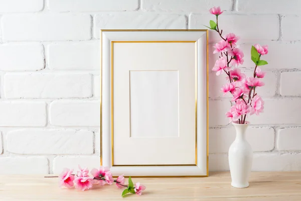 White frame mockup with pink flower bunch