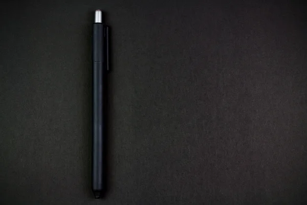 Classic pen on black background