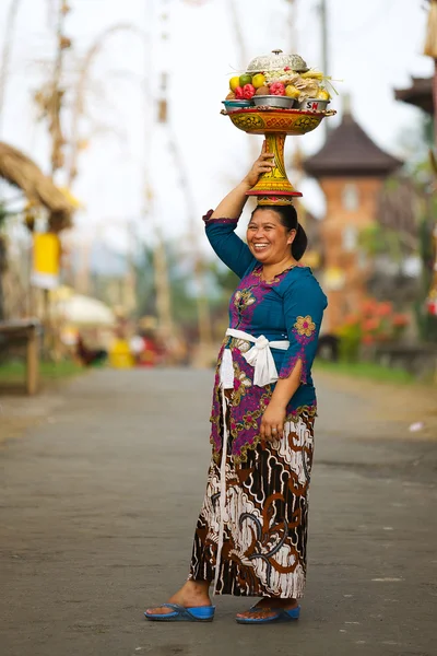 Balinese woman with offerings