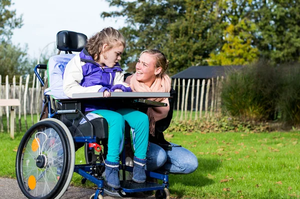 Disabled child in a wheelchair