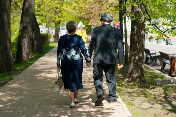 Couple elderly for a walk