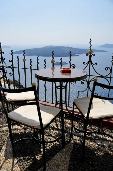 A table at a restaurant overlooking the sea and the volcano, dating, table for two, a table in the restaurant with stunning views