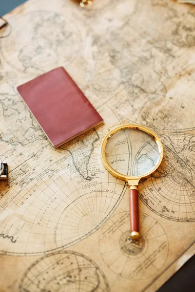 Vintage compass, magnifying glass, pocket watch