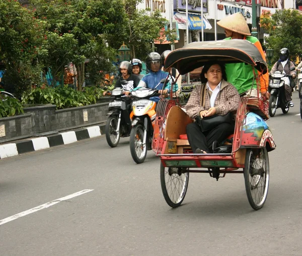 Traditional rikshaw transport in Yogyakarta