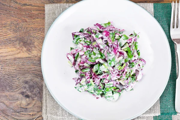 Lettuce, Radicchio and natural low-fat yogurt. Dietary meal