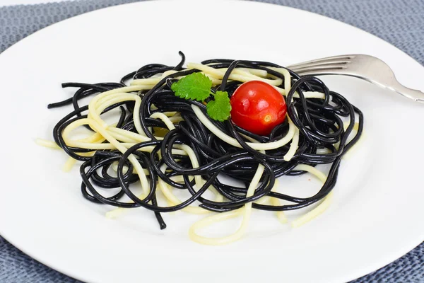 Black Spaghetti with Cuttlefish Ink, Tomato and Basil. Mediterra