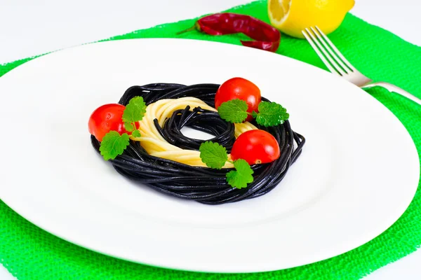 Black Spaghetti with Cuttlefish Ink, Tomato and Basil. Mediterra