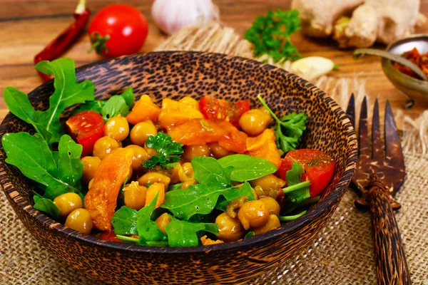Salad with Chickpeas in a Curry Sauce, Arugula, Grilled Pumpkin