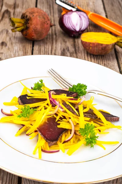 Salad of Yellow Beets with Red Onion and Beef Jerky