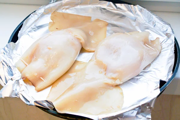 Dietary Food: Peeled Fresh Squid for Cooking on Fire.