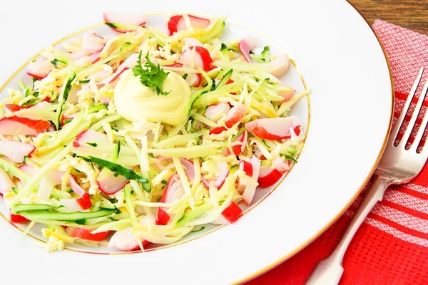 Dietary Salad with Crab Sticks, Cucumber and Cheese