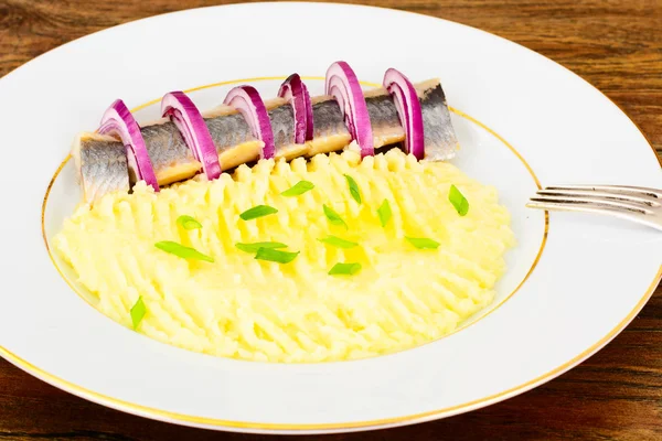 Mashed Potatoes with Herring and Red Pickled Onions