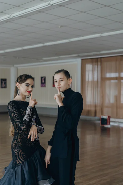 Professional dancers dancing in ballroom. Latin.