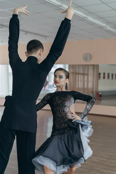 Professional dancers dancing in ballroom. Latin.